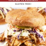Shredded BBQ chicken with coleslaw and pickled jalapenos on toasted buns.
