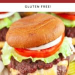 Grilled Juicy Lucy burger with lettuce, tomato, and onion on toasted bun.
