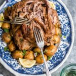 Greek Lamb and Potatoes On White and Blue Serving Platter