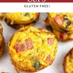 Denver omelette egg muffins stacked on white surface.