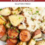Sheet pan sausage and potatoes with sauerkraut in white bowl.