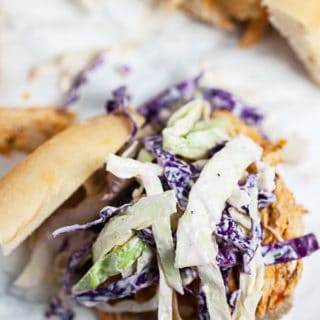 Shredded buffalo chicken sandwiches with blue cheese coleslaw.