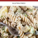 Dill pickle pasta salad in bowl with fork.