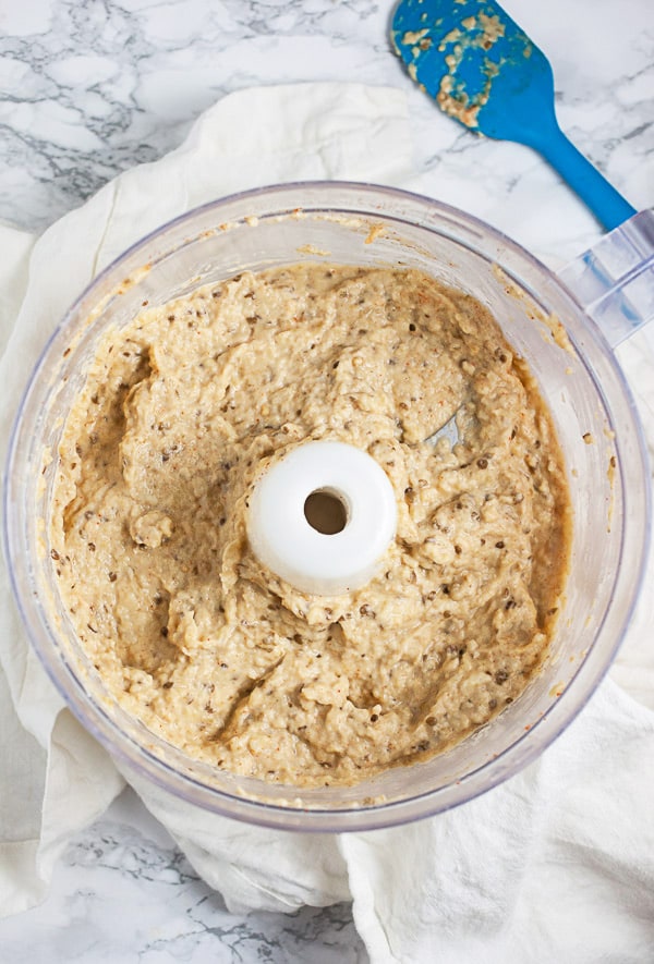 Eggplant dip mixed together in food processor.