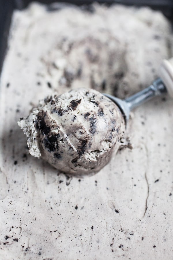 Scoop of ice cream in metal loaf pan.