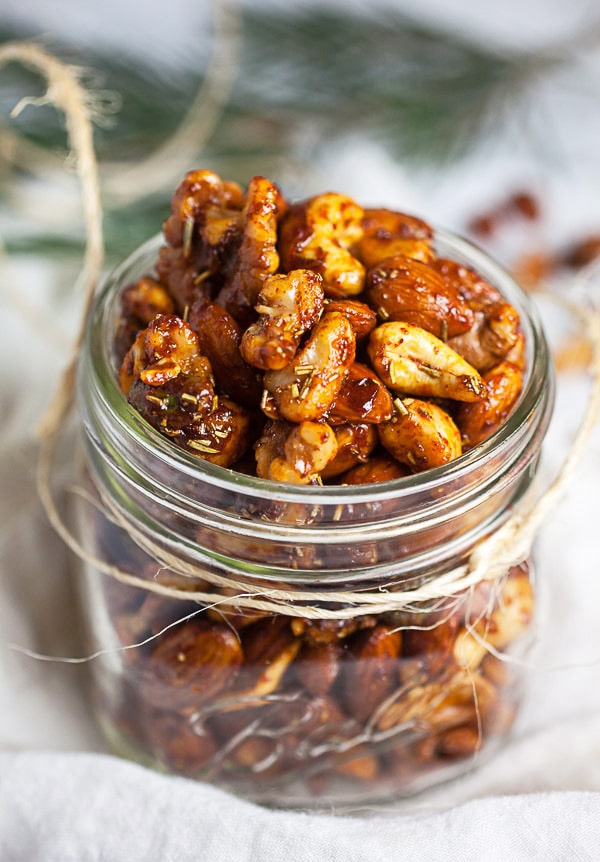 Maple roasted mixed nuts in glass mason jar.