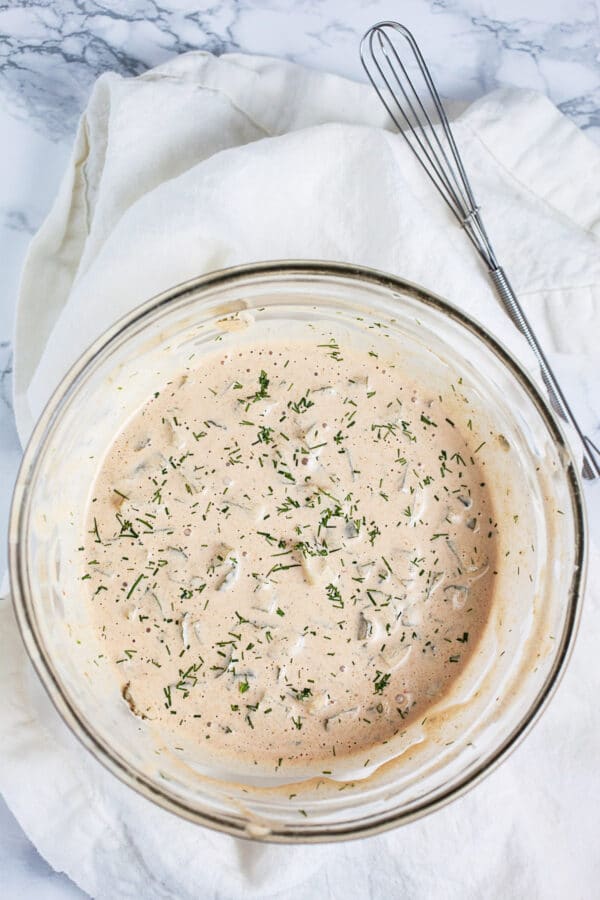 Homemade Thousand Island dressing in small glass bowl.