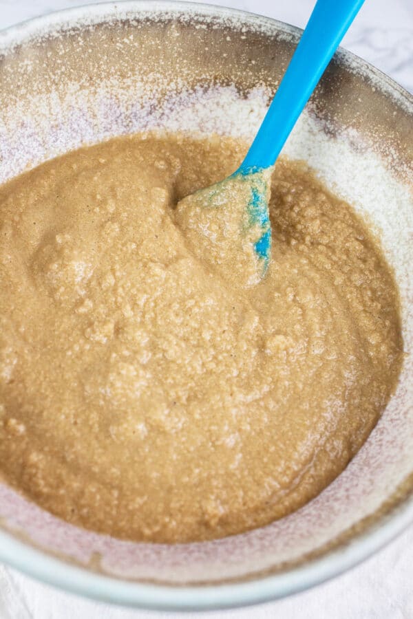 Creamed butter and brown sugar in ceramic bowl.