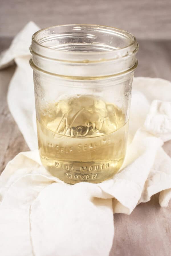Simple syrup in glass mason jar.