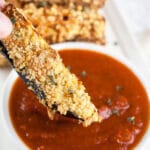 Air fryer eggplant Parmesan fries dipped into marinara sauce.