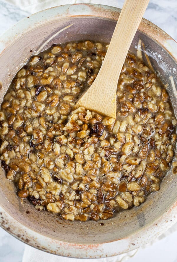 Maple walnut pie filling in ceramic bowl.