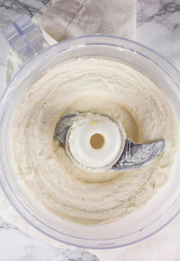 Whipped feta cheese mixture in food processor.