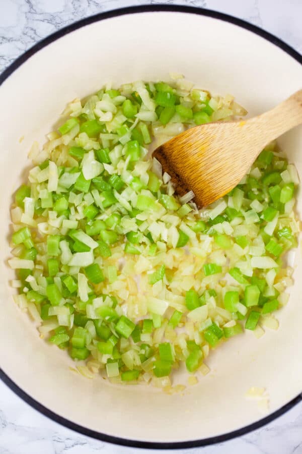 Garlic, onions, and celery sautéed in Dutch oven.