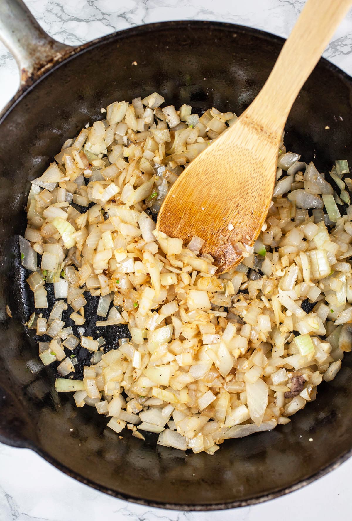 Sautéed garlic and onions in cast iron Dutch oven.