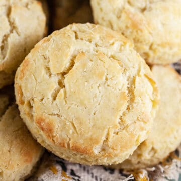 Gluten free biscuits in bowl with towel.