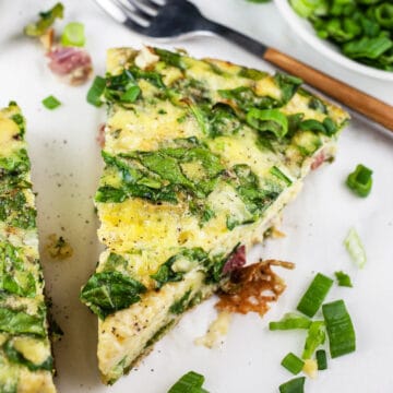 Ham and cheese frittata with green onions.