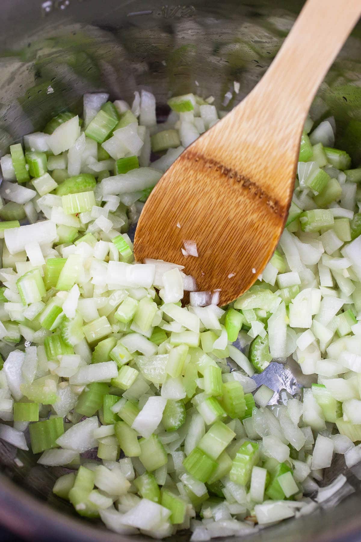 Garlic, onions, and celery sautéed in Instant Pot.