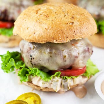 Grilled burgers with jalapeno burger sauce.