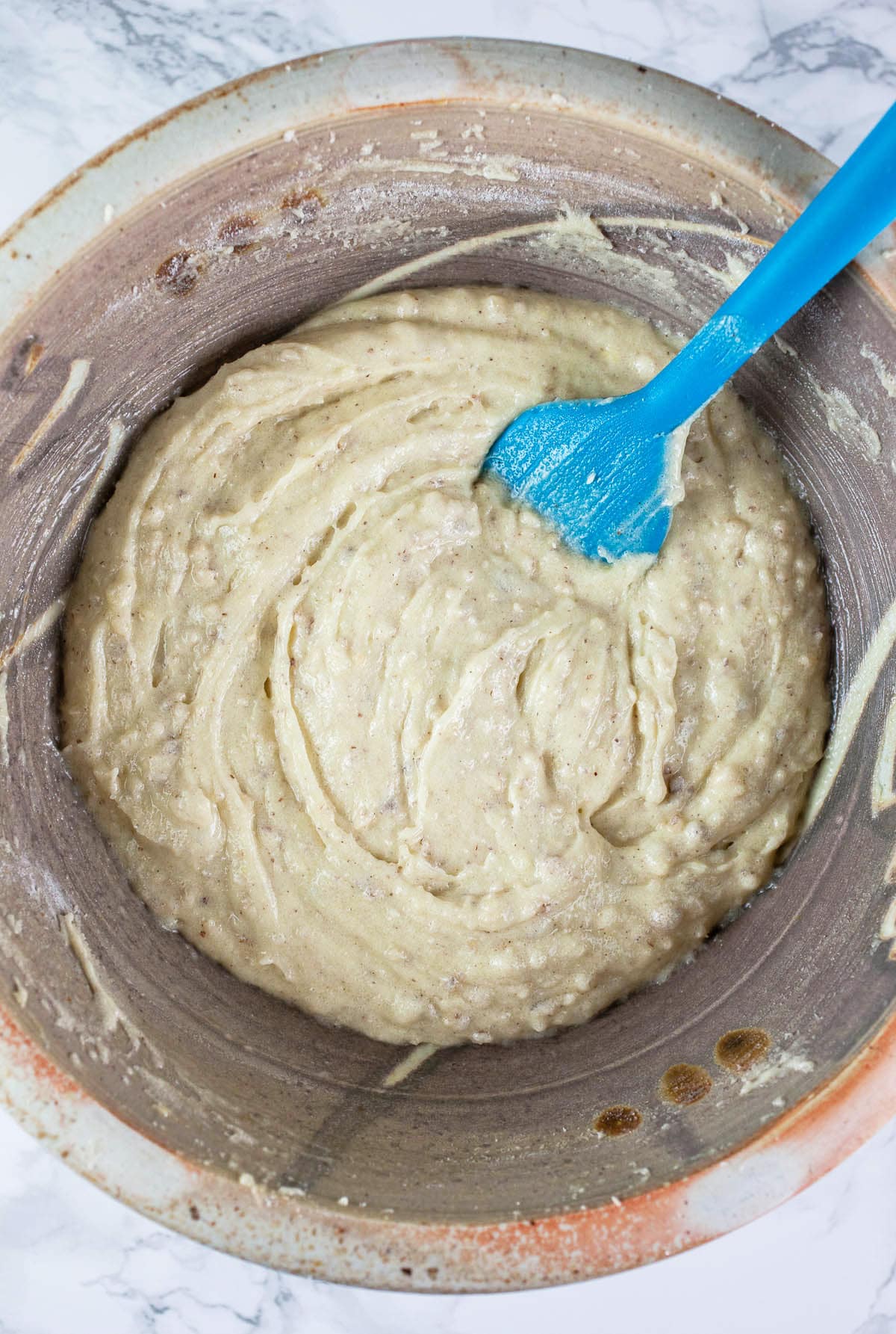 Italian cake mix batter in ceramic bowl.