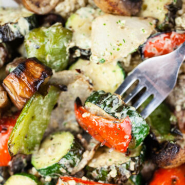 Mediterranean summer roasted vegetable salad with tahini sauce.