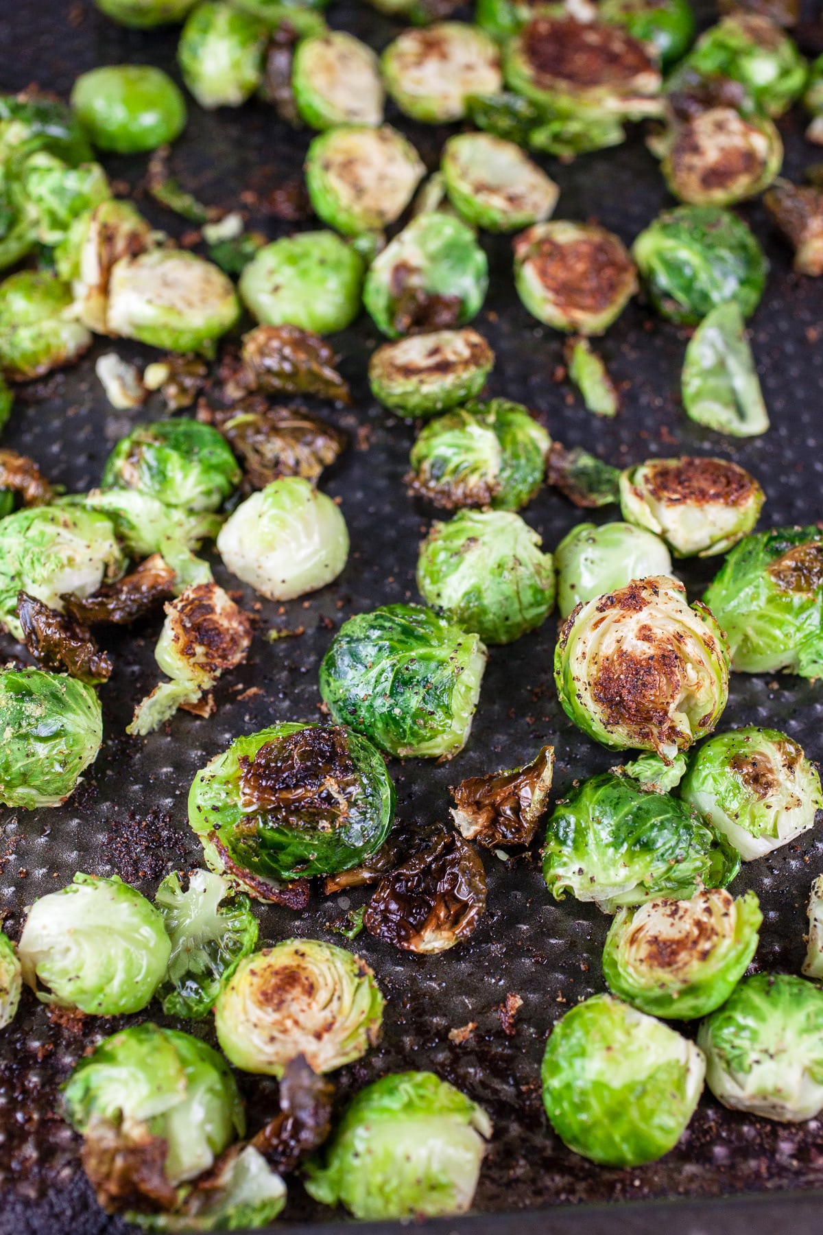 Roasted Brussels sprouts on baking sheet.