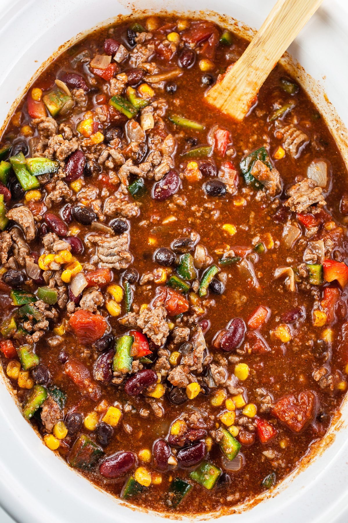 Uncooked chili in slow cooker.