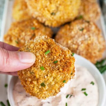 Baked rice balls dipped into chipotle sour cream.