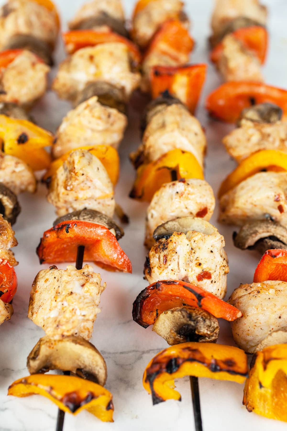 Grilled chicken and vegetable skewers.