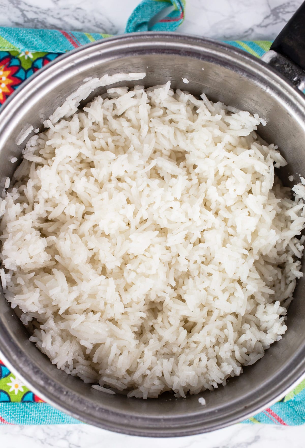 Cooked rice in sauce pan.