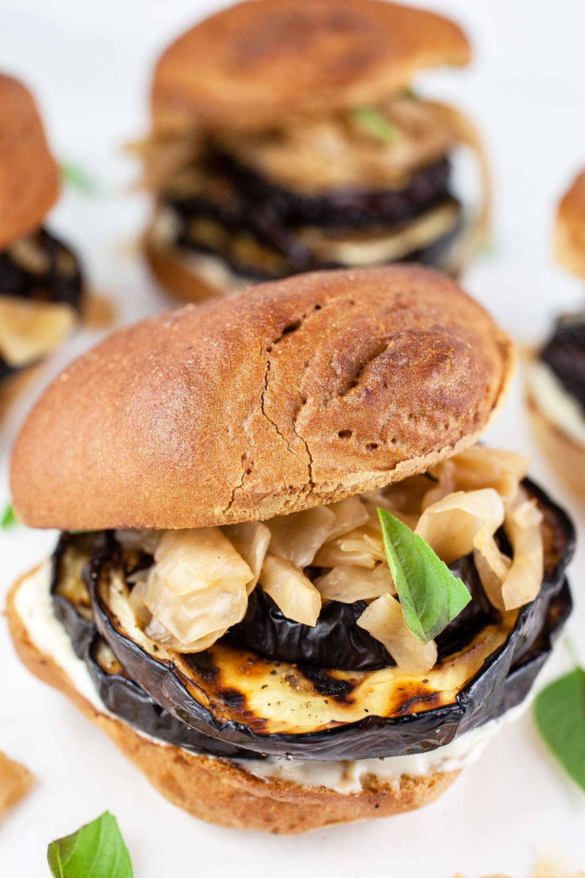 Grilled eggplant sandwiches with kimchi, miso mayo, and Thai basil.