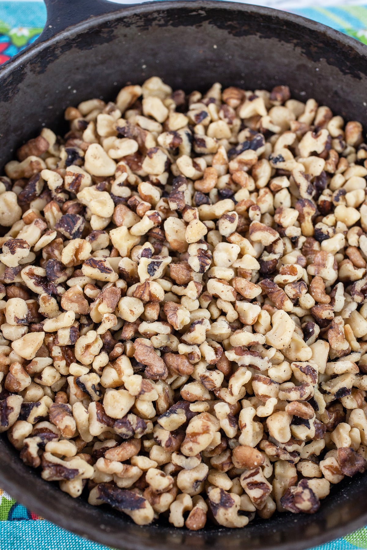 Walnut pieces toasted in small cast iron skillet.