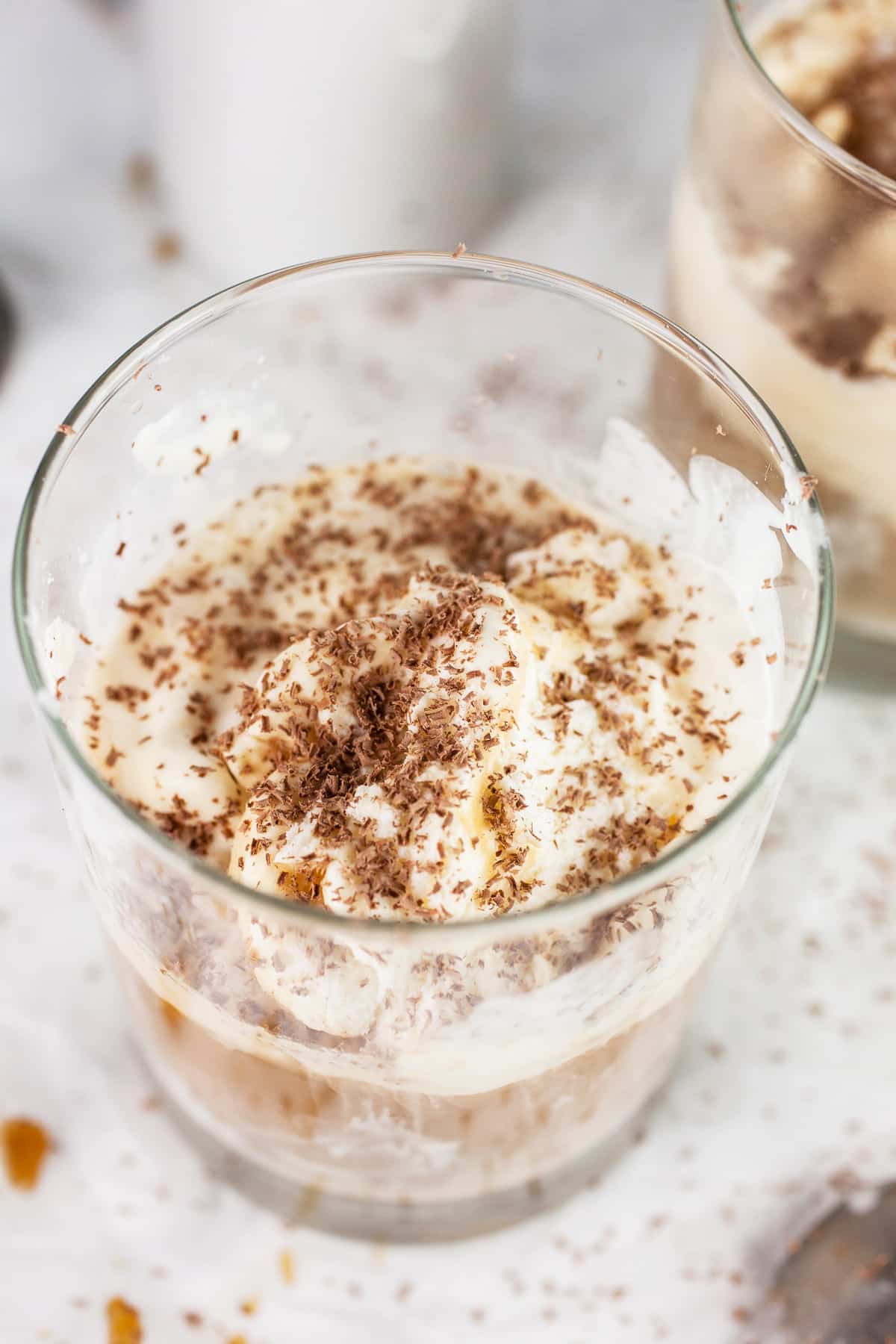 Baileys ice cream affogato garnished with chocolate shavings in glasses.