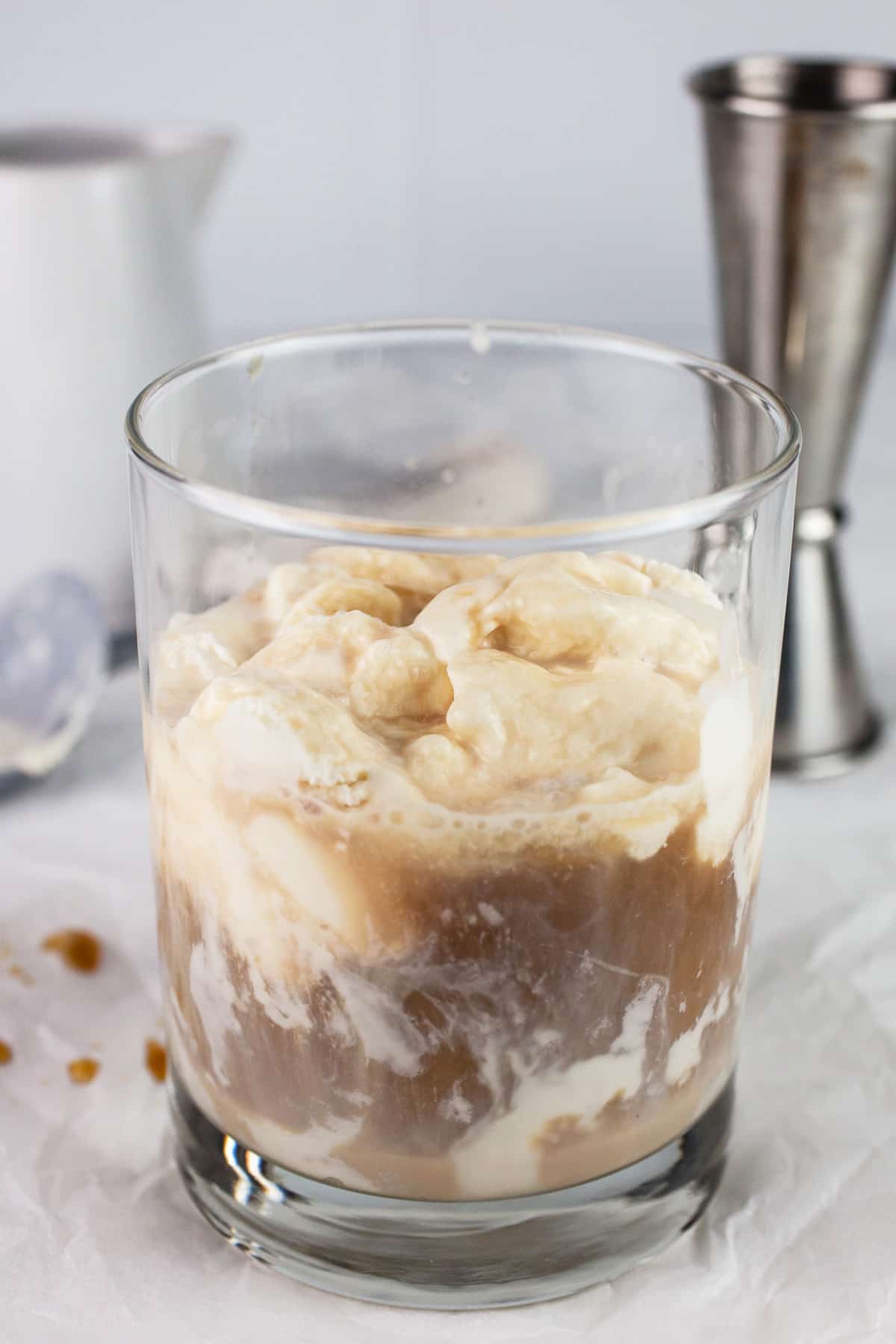 Baileys ice cream affogato with coffee in glass.