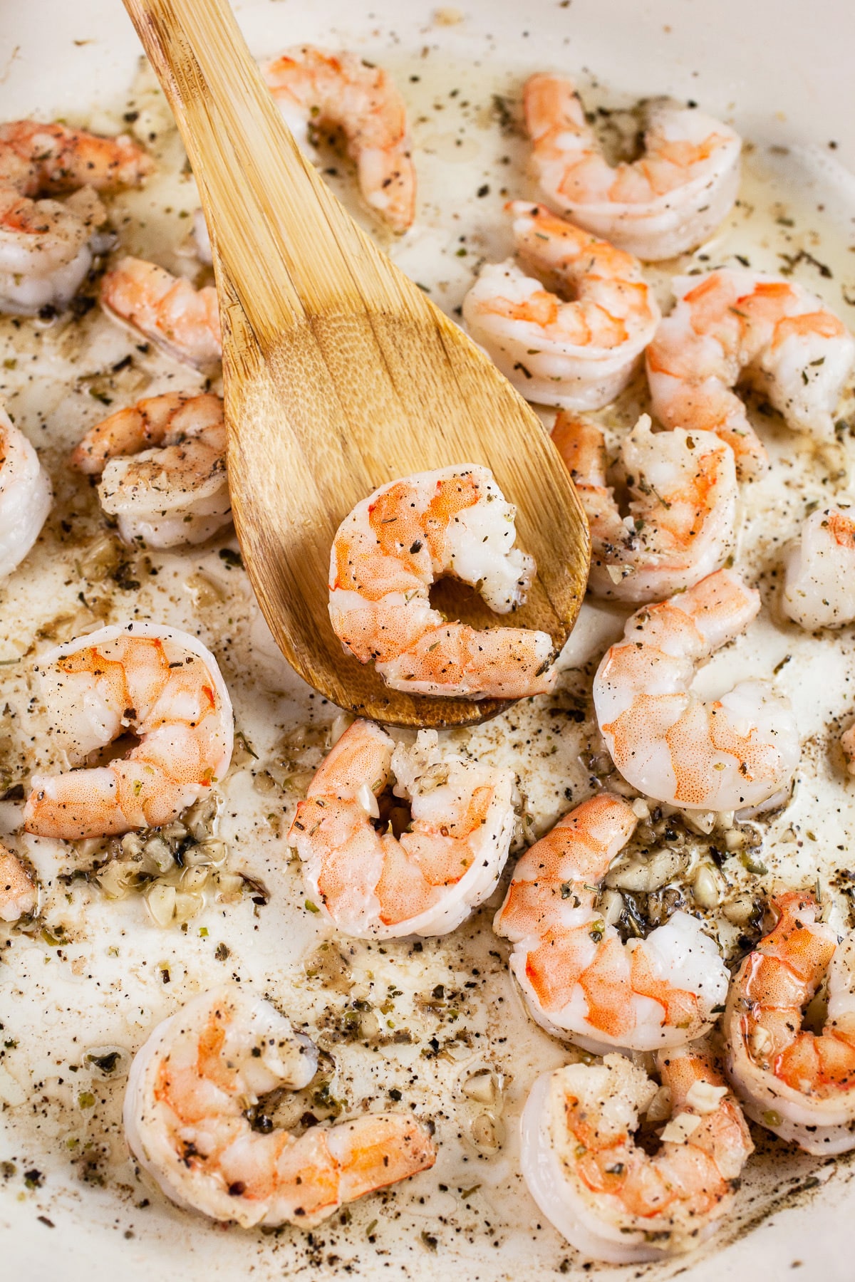 Shrimp sautéed in skillet with olive oil, garlic, salt and pepper.