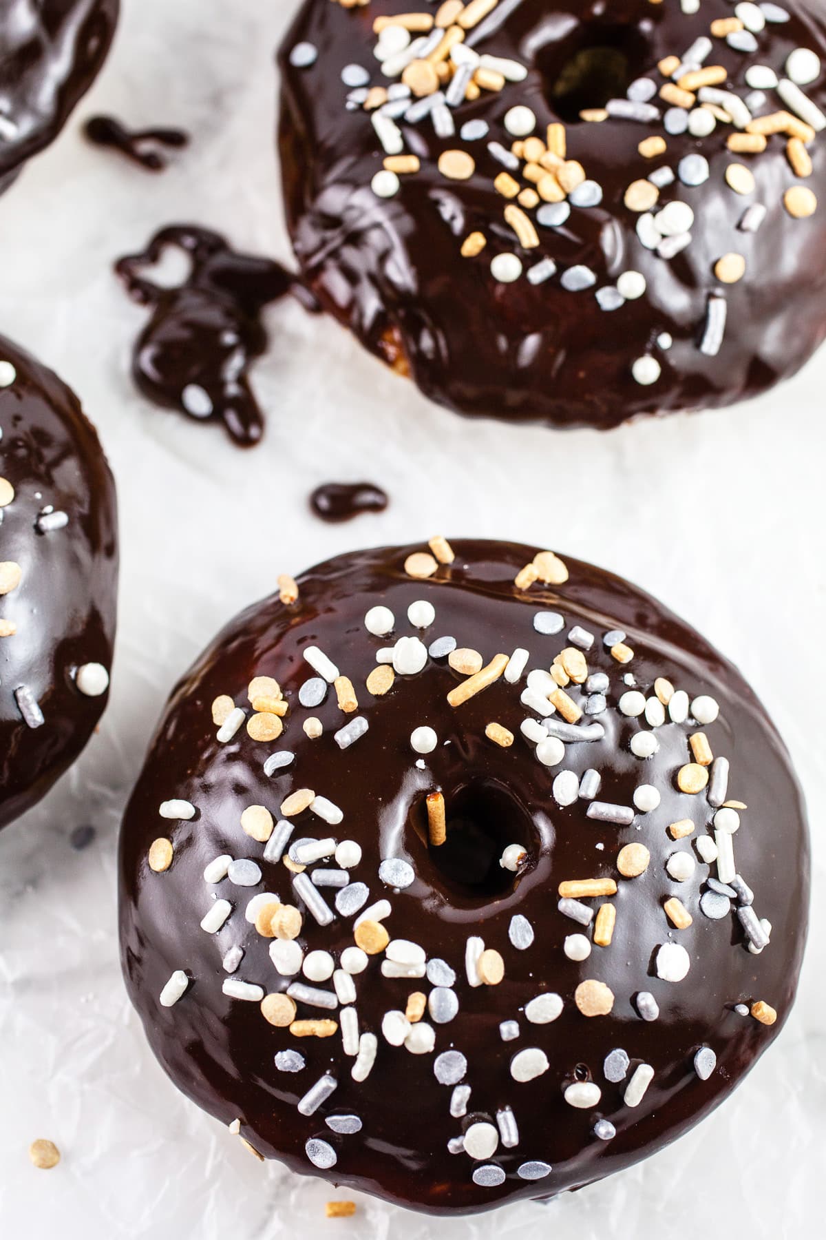 Baileys doughnuts with chocolate ganache and sprinkles.