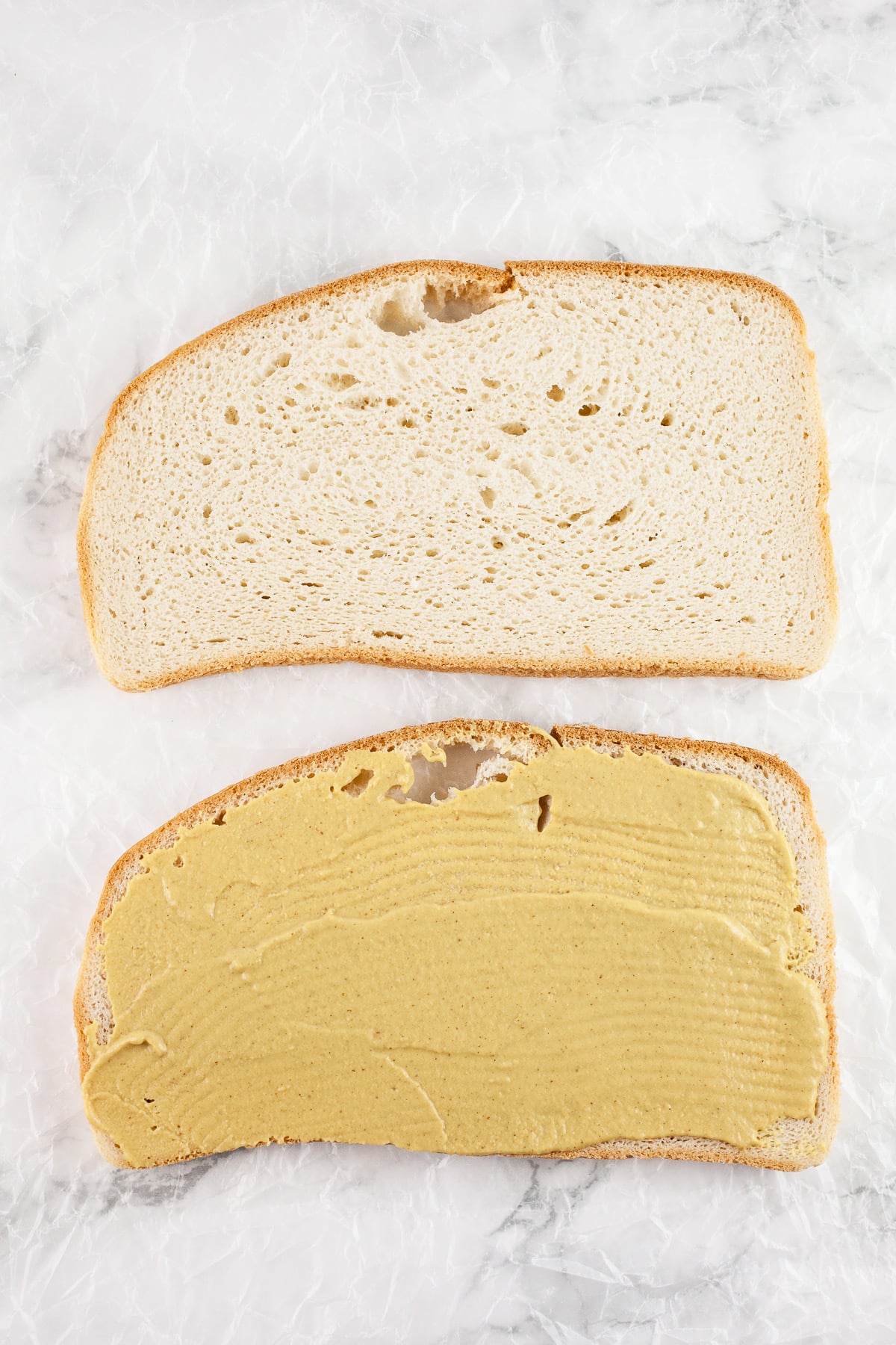 Sliced bread with Dijon mustard.