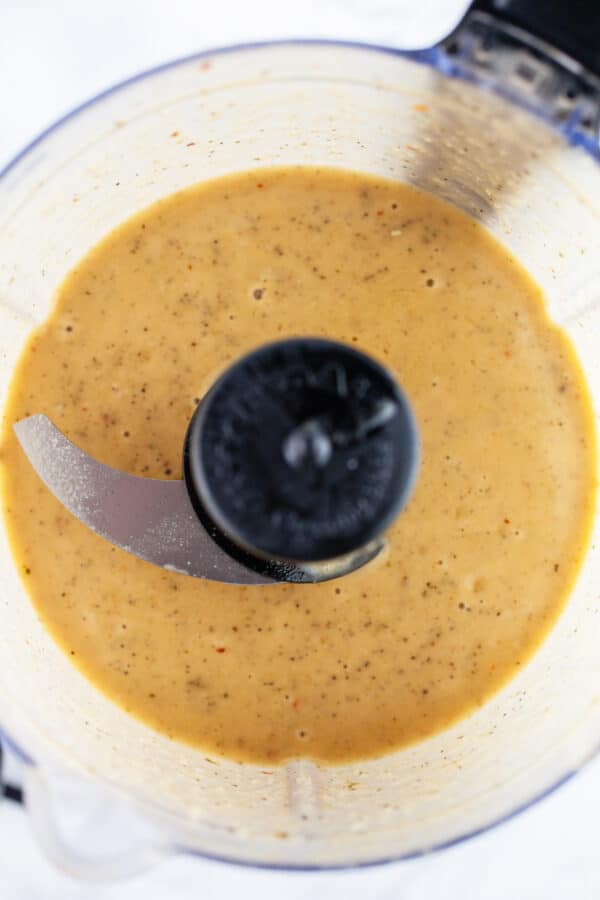 Parmesan vinaigrette in food processor.