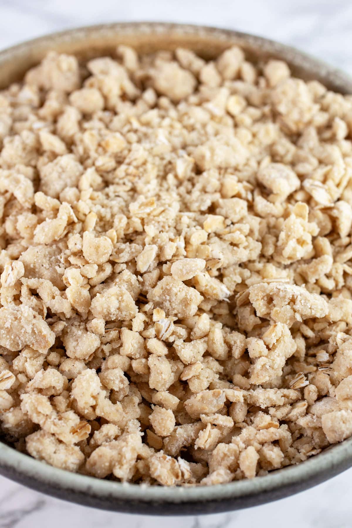 Streusel topping in ceramic bowl.