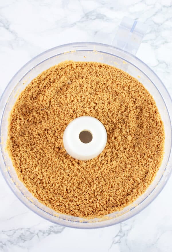Gluten free graham cracker crumbs in food processor.