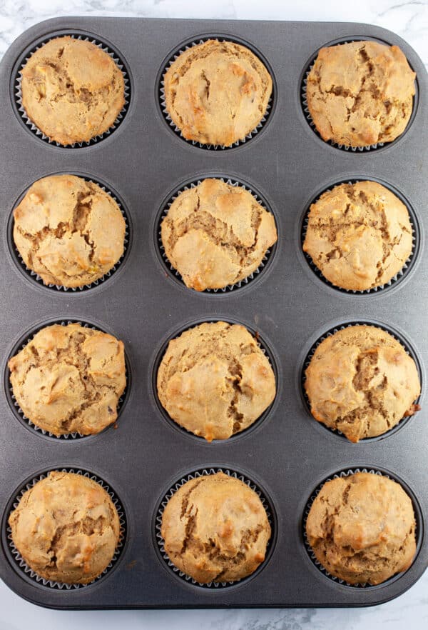 Baked banana walnut muffins in muffin tin.