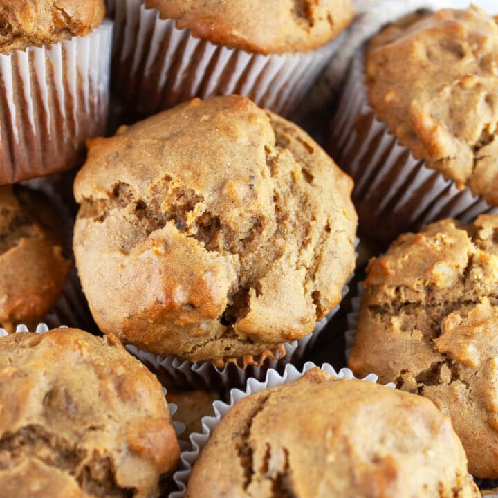 Roasted banana walnut muffins in bowl.