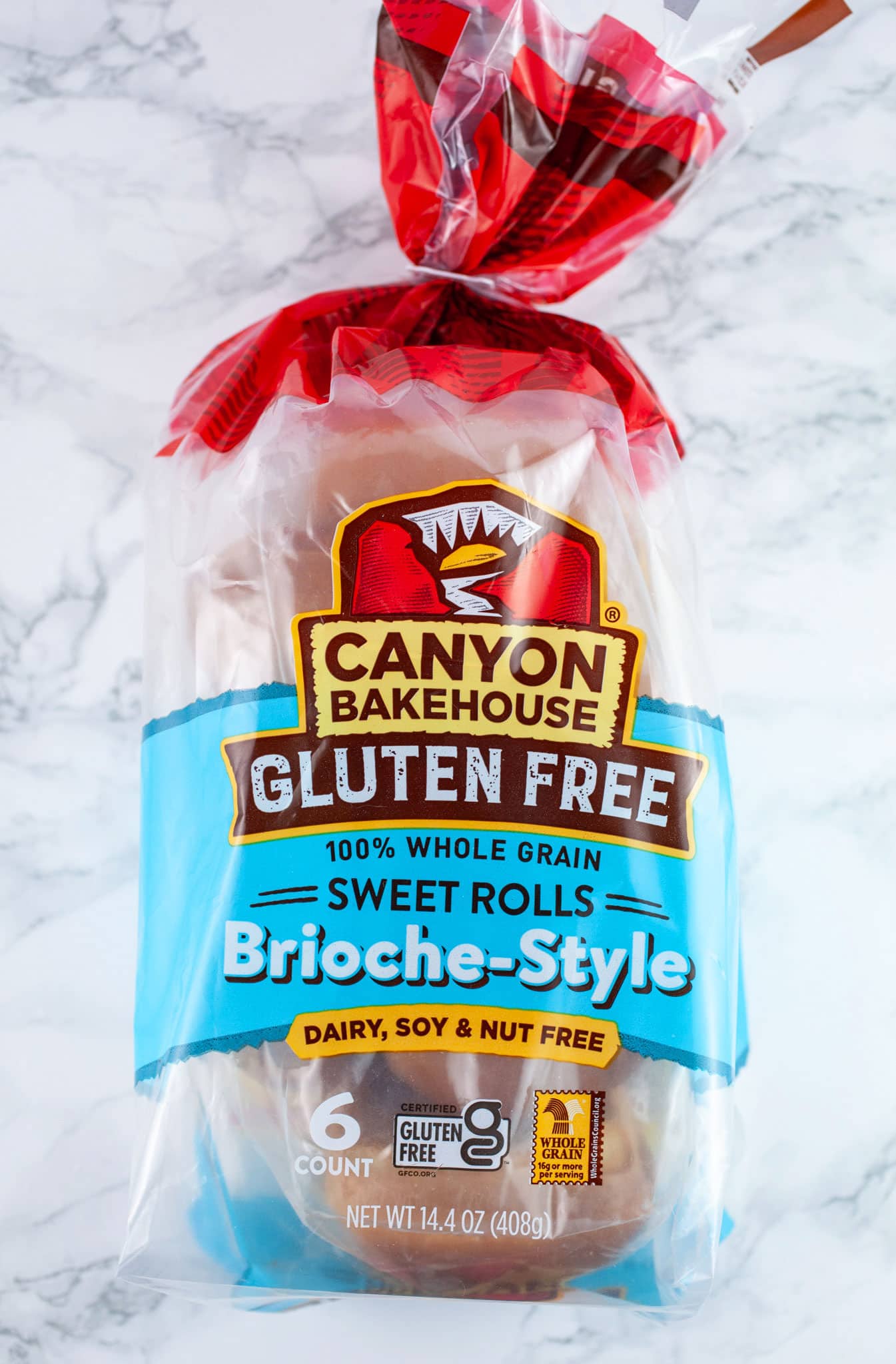 Unopened package of Canyon Bakehouse gluten free brioche buns.
