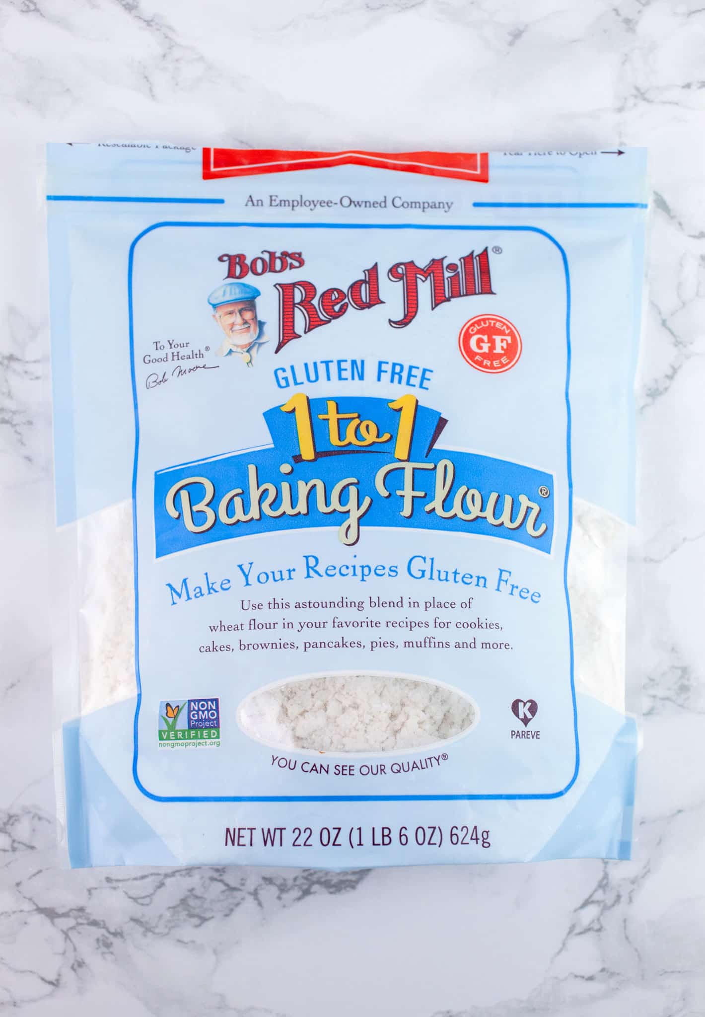 Bag of Bob's Red Mill 1 to 1 Flour on white surface.