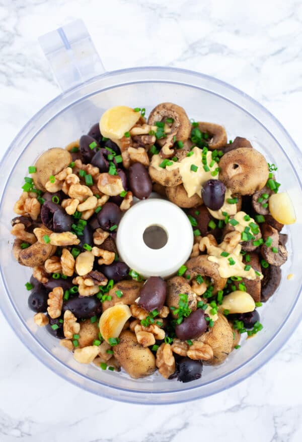 Grilled mushrooms, Kalamata olives, roasted garlic, toasted walnuts, Dijon mustard, lemon juice, and fresh chives in food processor.