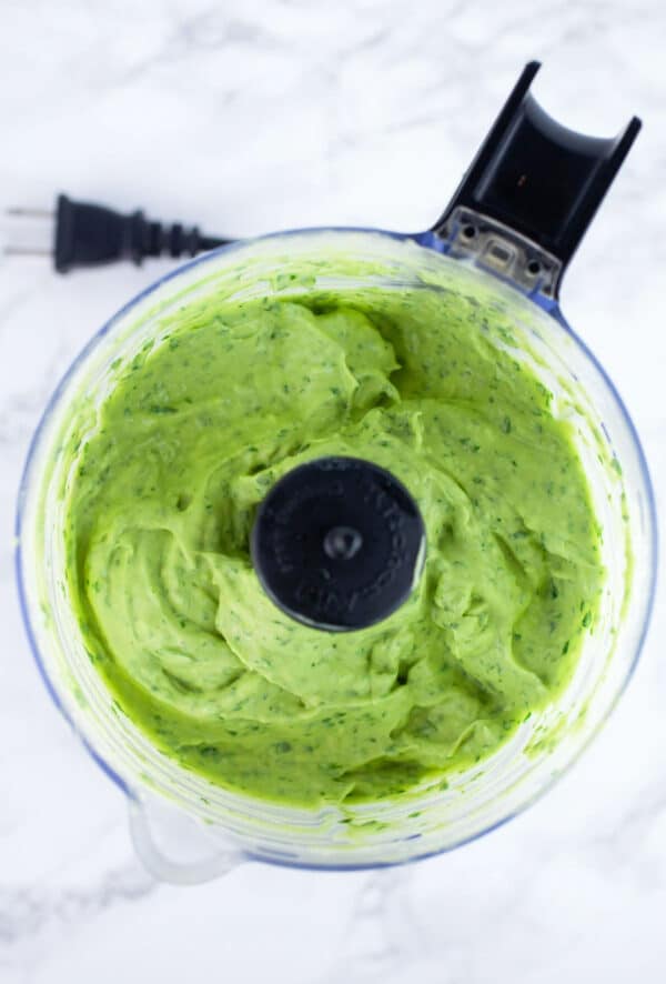 Avocado sauce in food processor.