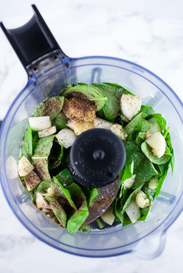 Fresh basil, garlic, shallots, Dijon mustard, white wine vinegar, maple syrup, kosher salt and pepper in small food processor.